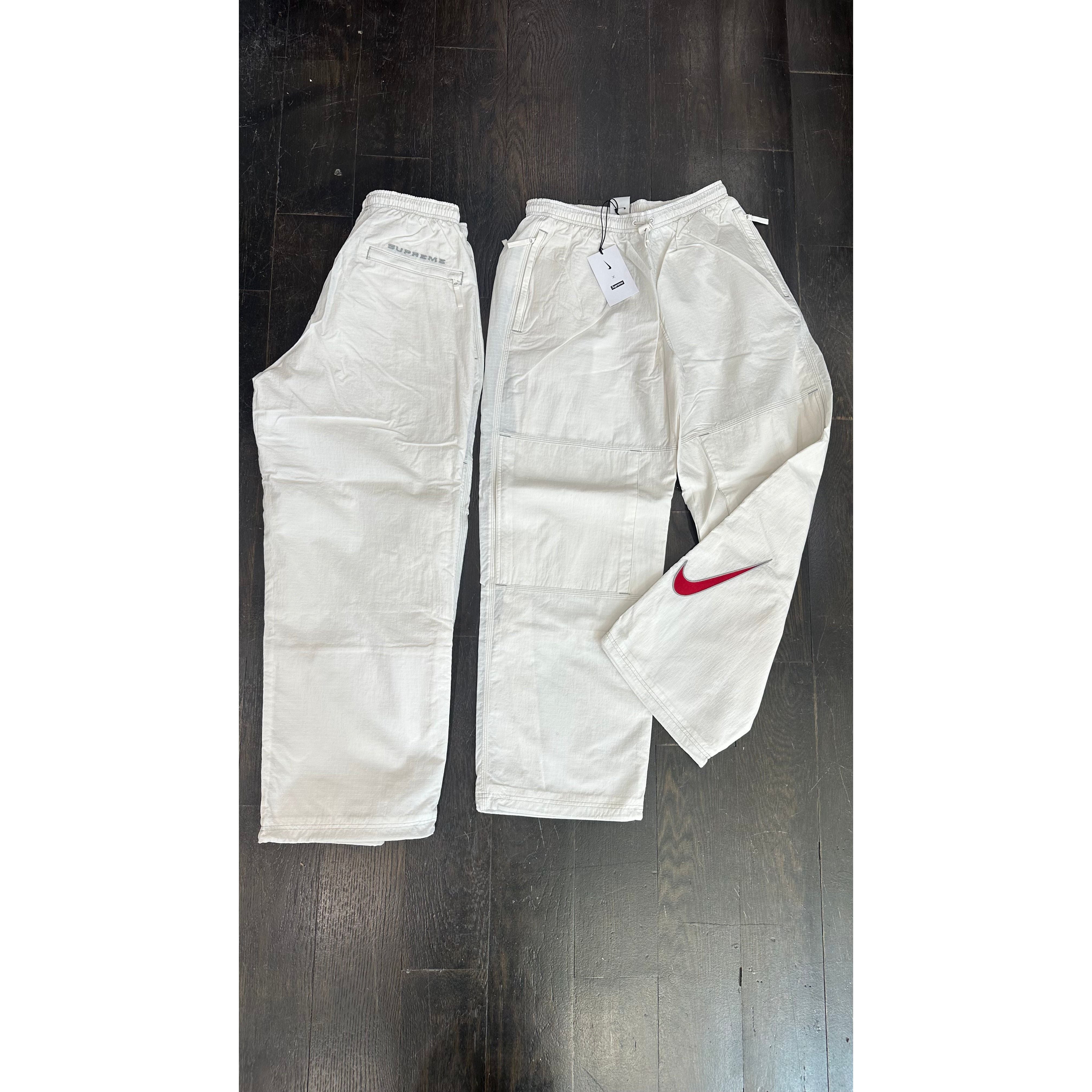 Nike supreme track pants hotsell